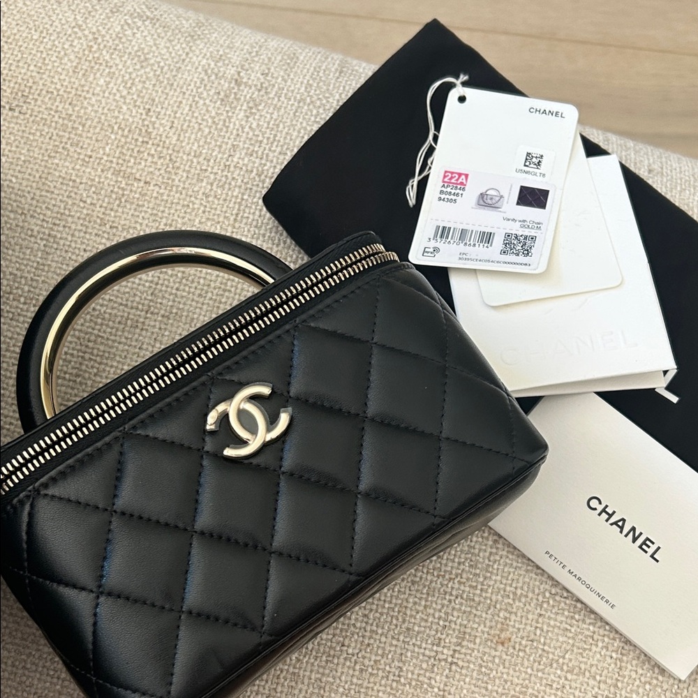 CHANEL Black Quilted Leather Mini Vanity Bag with Gold Hardware